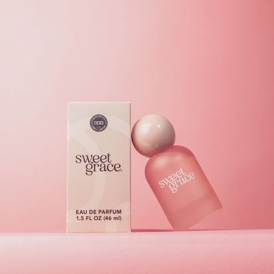 Bridgewater Candle Sweet Grace Eau de Parfum in a frosted pink glass bottle against a neutral studio background