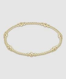 Gold 4mm delicate bracelet by ENEWTON displayed on a white background, showcasing the smooth polished band and minimal beaded design.