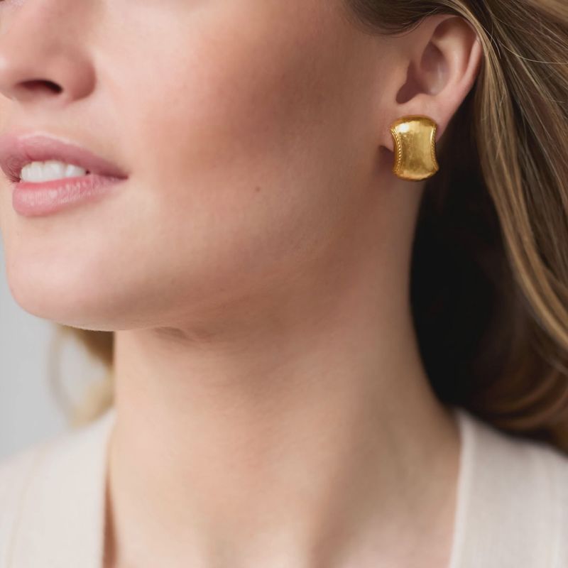 Julie Vos Cannes clip-on earring in 24K gold plate displayed in a lifestyle setting