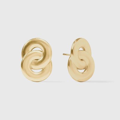Julie Vos Infinity Post Earrings in 24K gold plate, 0.9 inches, shown on neutral background
