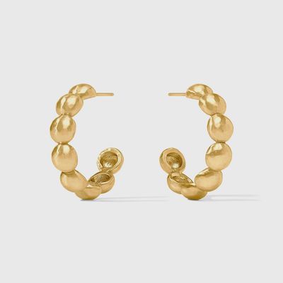 Julie Vos Solara Nova hoop earrings in 24K gold plate displayed on a neutral surface in natural light