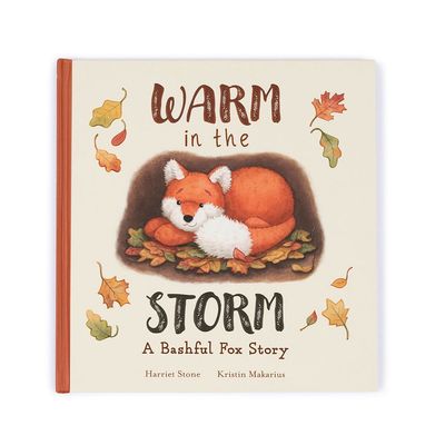 Jellycat Warm in the Storm hardback children's book displayed against a neutral background, showing the illustrated cover.