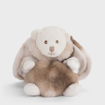 Gray plush Ziggy Winter Rabbit by Bukowski Bears positioned in a cozy indoor setting
