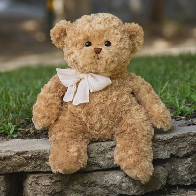 Big Boy Anton plush stuffed animal by Bukowski Bears, 22 inches tall, displayed in a lifestyle setting showing the soft fabric and neutral-toned design.
