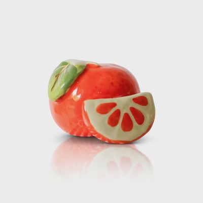 Nora Fleming Cutie Pie Citrus mini attachment, featuring a small ceramic piece with citrus fruit design on a white background