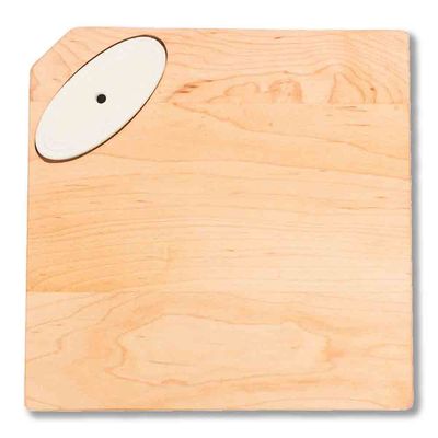 Maple wood cheese board handcrafted in Vermont, displayed in a lifestyle setting with artisanal cheese and charcuterie