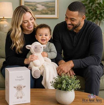 Happy baby with parents holding lamb snuggler plush and blanket, baby gift set displayed in cozy living room