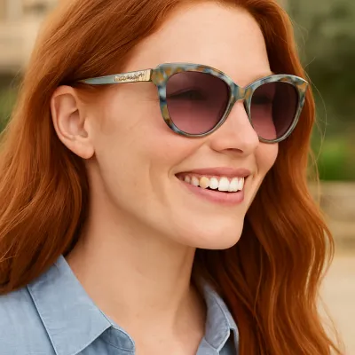 Brighton Intrigue beach sunglasses with UV protection displayed in a lifestyle setting outdoors