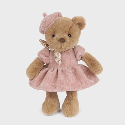 Mon Ami Bernadette Bear, an 11-inch rose-pink plush stuffed animal, displayed against a neutral studio background