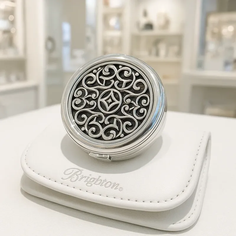 Brighton Serendipity Sculptural Frieze collectible pill box displayed in a lifestyle setting, showing ornate metalwork detailing and decorative design.