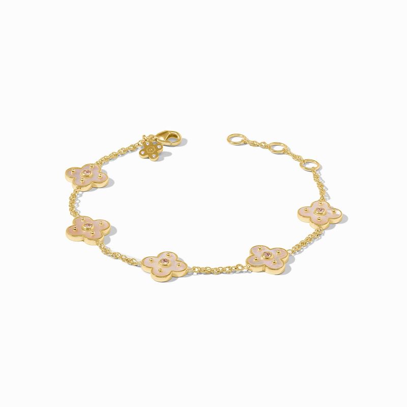Julie Vos Colette bracelet in 24K gold plate with cubic zirconia and mother of pearl accents worn on a wrist