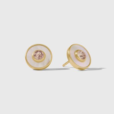 Julie Vos Colette circle stud earrings in 24K gold with cubic zirconia and mother of pearl accents, worn in a lifestyle setting