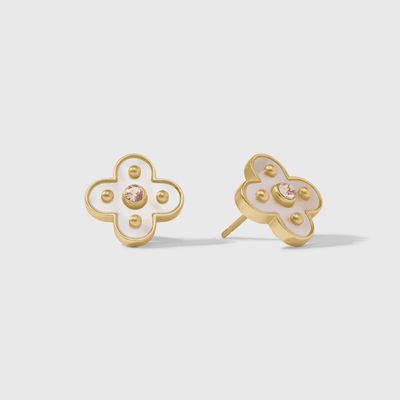 Julie Vos Colette stud earrings in 24K gold with cubic zirconia and mother of pearl in a lifestyle setting.