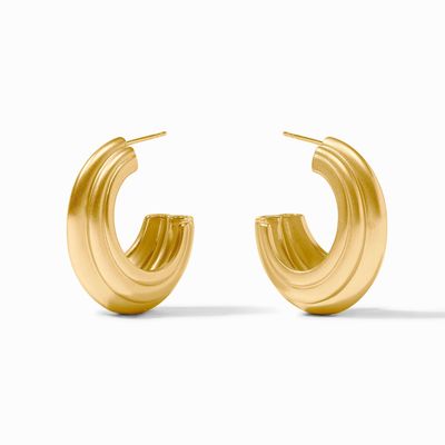 Julie Vos Portofino statement hoop earrings in 24K gold plate worn in a lifestyle setting