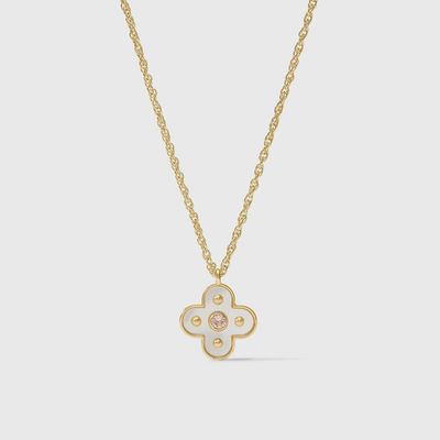 Julie Vos Colette pendant necklace in 24K gold with cubic zirconia and mother of pearl, worn in a lifestyle setting.