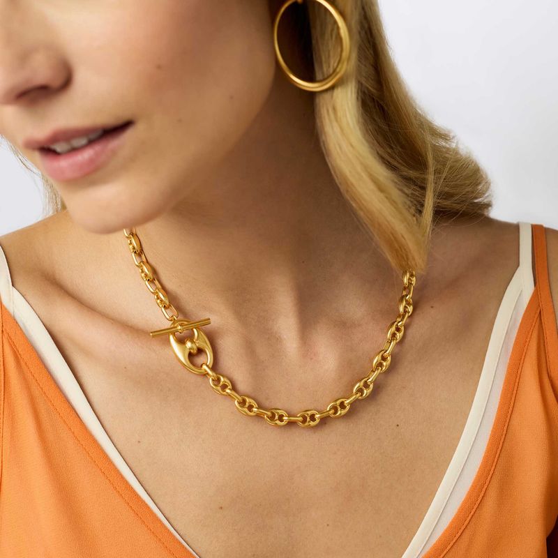 Julie Vos Laguna demi link necklace in 24K gold plate worn in a lifestyle setting, showing the adjustable chain detail