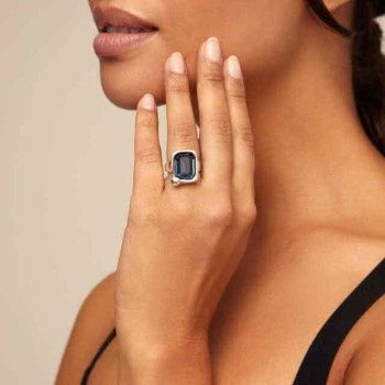 Uno de 50 Core Blue Stone Statement Ring worn on hand in lifestyle setting, featuring blue stone with metallic detailing