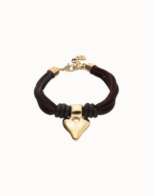 Handmade heart silk and leather bracelet from Uno de 50's Beat Collection, displayed on neutral background in studio lighting