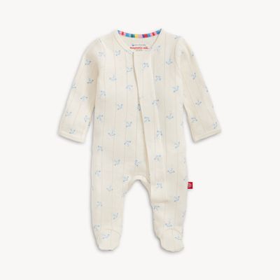 Magnetic Me airplanes organic cotton pointelle magnetic footie sleeper in neutral tones displayed flat on a white background