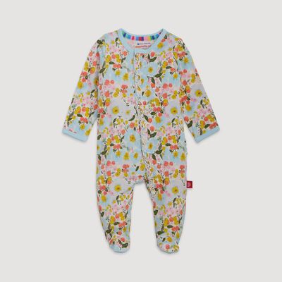Seraphina modal magnetic footie in studio setting, featuring SewSafe closures and neutral tone fabric
