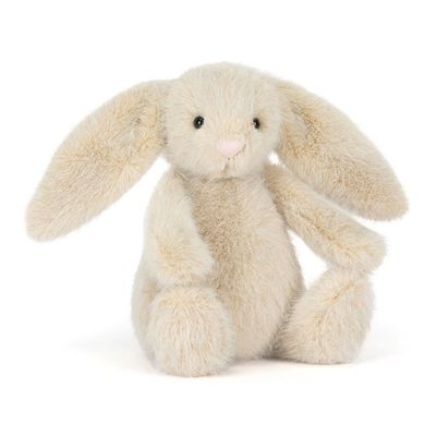 Wheat-colored Jellycat Flufflet bunny plush toy with soft fur and embroidered details, shown against a neutral studio background