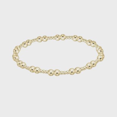 ENEWTON Together gold 4mm stackable bracelet isolated on white background, showcasing minimalist polished design