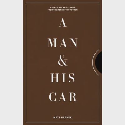 Man and His Car coffee table book by Hachette featuring 80 celebrity stories, displayed against a neutral background