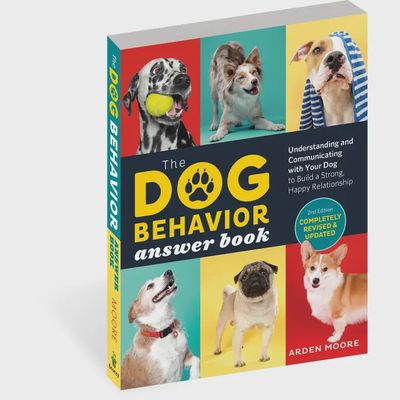 The Dog Behavior Answer Book, 2nd Edition book cover displayed against a white background