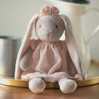 Lenka plush bear by Bukowski Bears positioned in a cozy home setting with soft lighting