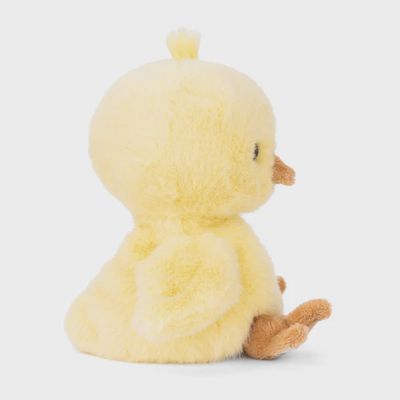 Yellow plush Baby Chicky stuffed animal by Bukowski Bears displayed in a lifestyle setting