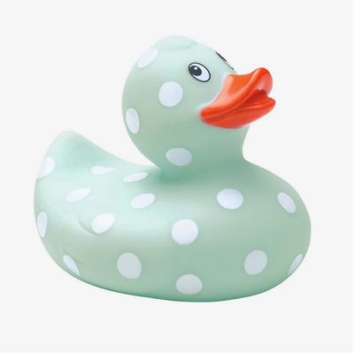 Yellow rubber duckie with white polka dot pattern, BPA-free bath toy on white background