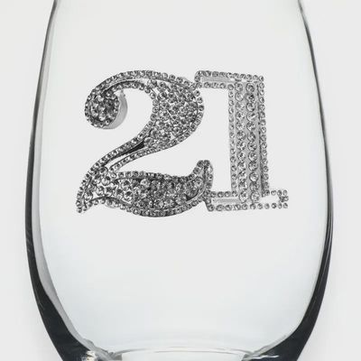 Jeweled stemless wine glass with rhinestone decorations and 21st birthday design on white background