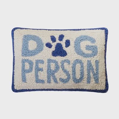 Dog Person wool hooked throw pillow in natural tones, 8 by 12 inches, displayed against a neutral background
