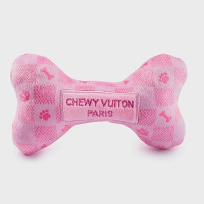 Pink checker plush dog bone toy with squeaker by Haute Diggity Dog on white background