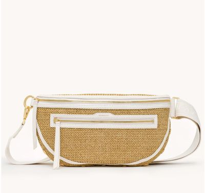 Hammitt Charles Large crossbody bag in calla lily white raffia material worn across the body in a lifestyle setting