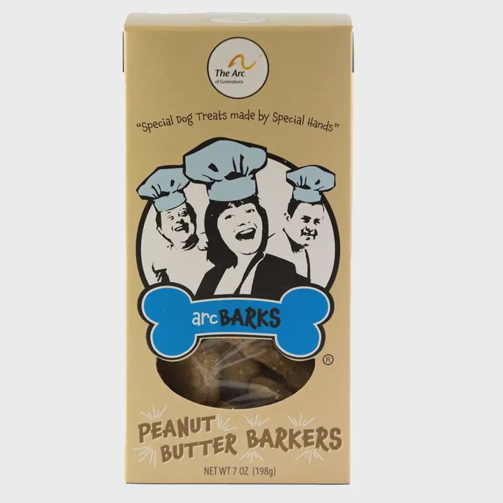 Peanut Butter Barker dog treats by arcBARKS in a studio setting, isolated against a white background