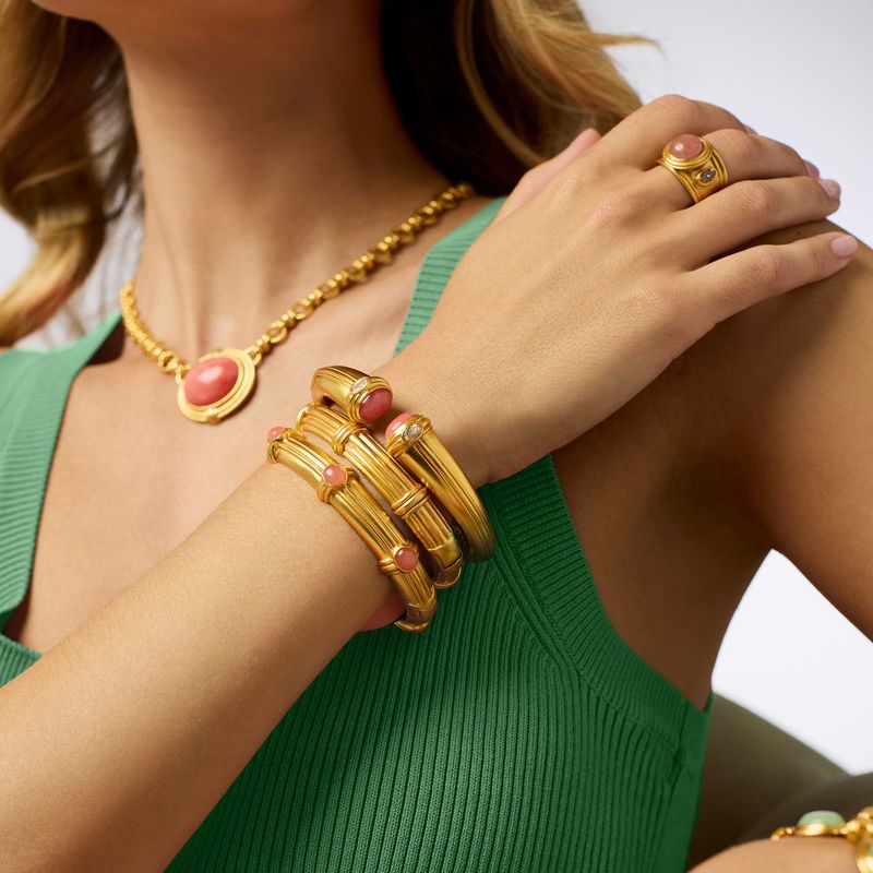 Julie Vos Portofino bangle in jade with 24K gold plate and spring hinge closure, worn in an everyday setting