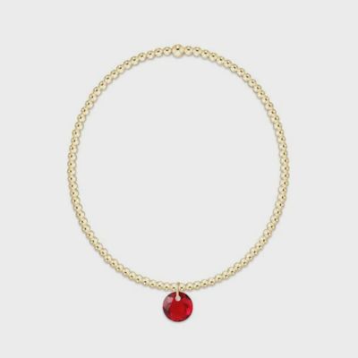 ENEWTON 2mm gold bracelet with small Reflection charm featuring January birthstone on white background