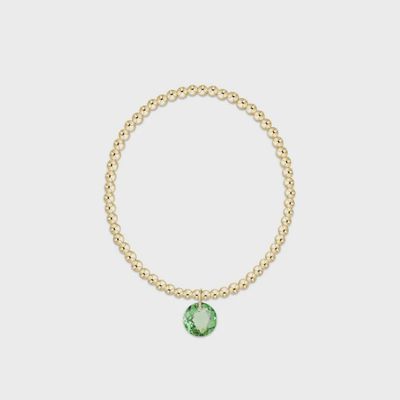 Gold beaded bracelet with 3mm smooth spheres and August Reflection charm on white background