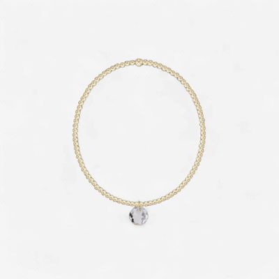 enewton Classic Gold 2mm beaded bracelet with April Reflection charm, displayed on a neutral background