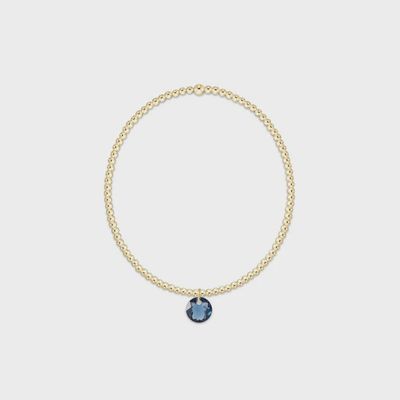 ENEWTON Classic Gold 2mm bracelet with September Reflection charm on a neutral background