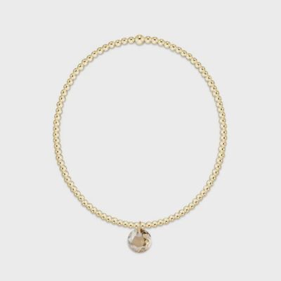 Gold 2mm beaded bracelet with November Reflection charm, displayed on white background