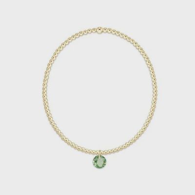 Gold ENEWTON Classic 2mm bracelet with August Reflection charm displayed on white background
