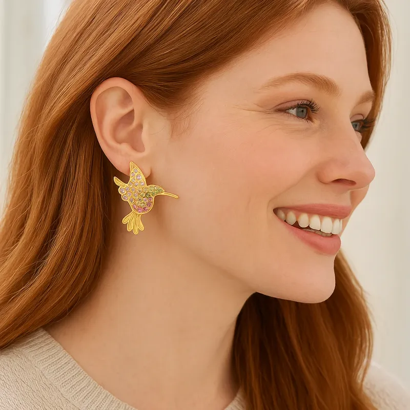 Brighton Enchanting Gem Hummingbird Earrings displayed in a lifestyle setting, featuring ornate hummingbird designs with gemstone accents.