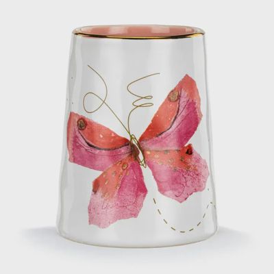 Small pink ceramic vase with butterfly motif and gold text reading Picked with Love, shown against white background