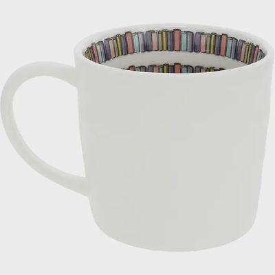 Book Lovers Club ceramic mug with raised decals displayed in a lifestyle setting, 16 oz capacity
