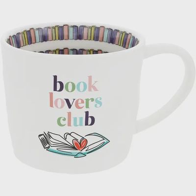 Pavillion Book Lovers Club ceramic mug in white with raised decal design, shown front-facing against neutral background