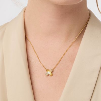 Julie Vos Catalina pavé bar necklace in 24K gold with cubic zirconia stones, shown worn in a lifestyle setting