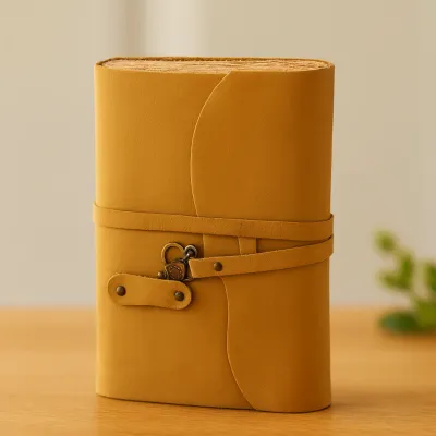 Assorted leather handcrafted journals in 8-inch size displayed in a lifestyle setting, showing natural leather textures and craftsmanship details.