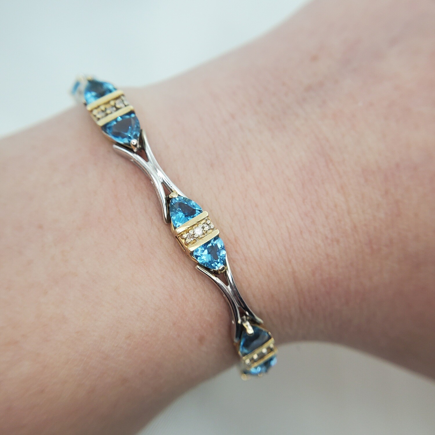 8CTW Trillion Cut Blue Topaz ,Two-Tone 14k Gold Bracelet with Diamonds